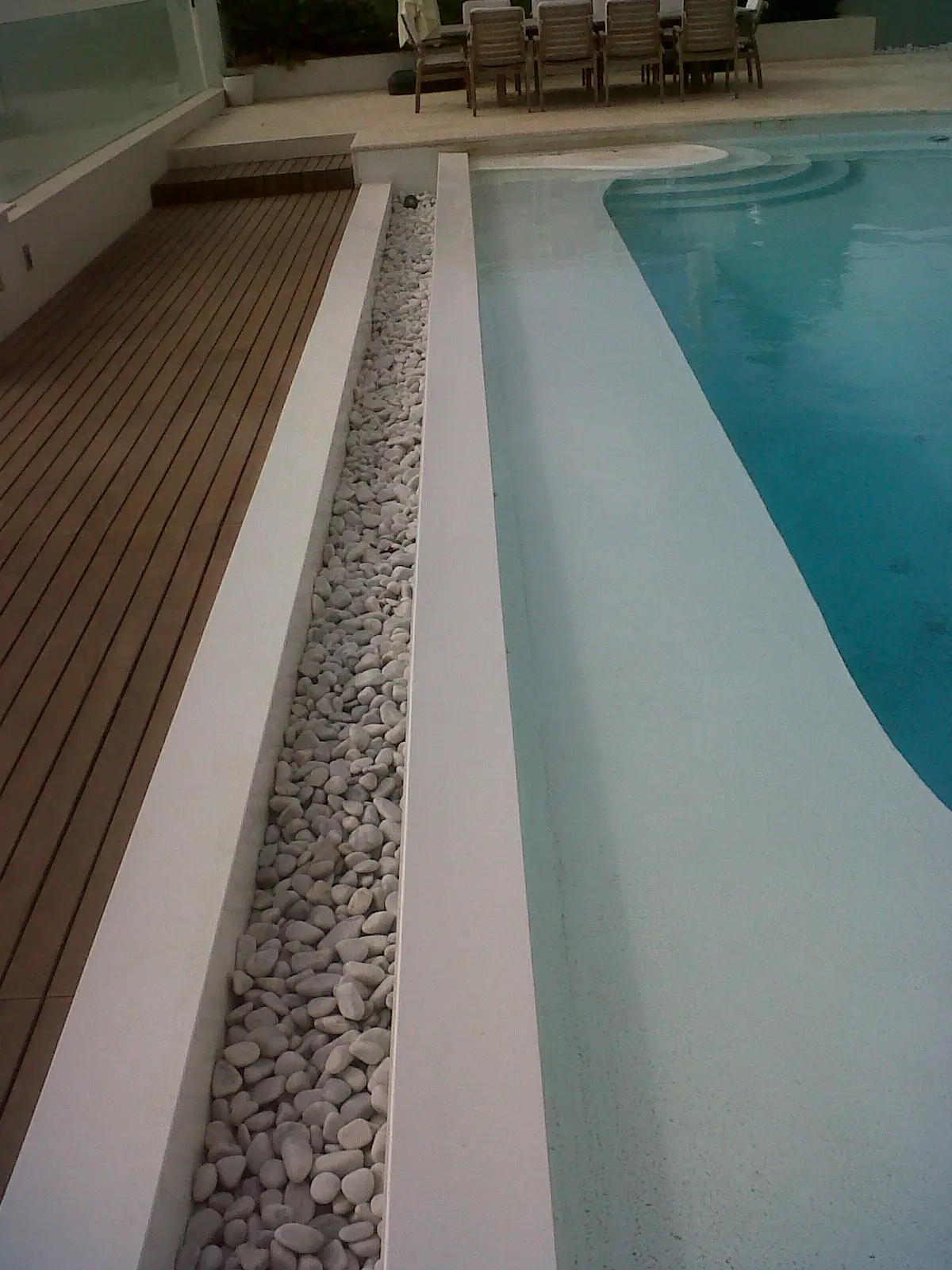 Poolside custom made overflow gutter — photo 1