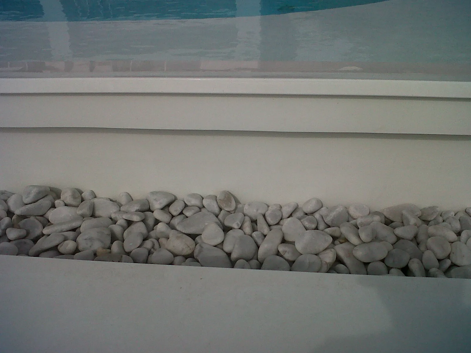 Poolside custom made overflow gutter — photo 2