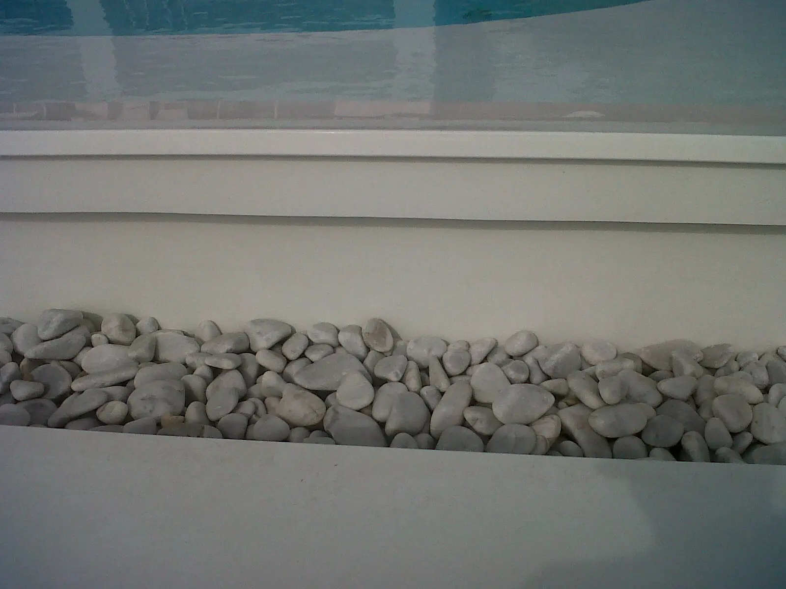 Poolside custom made overflow gutter — photo 2